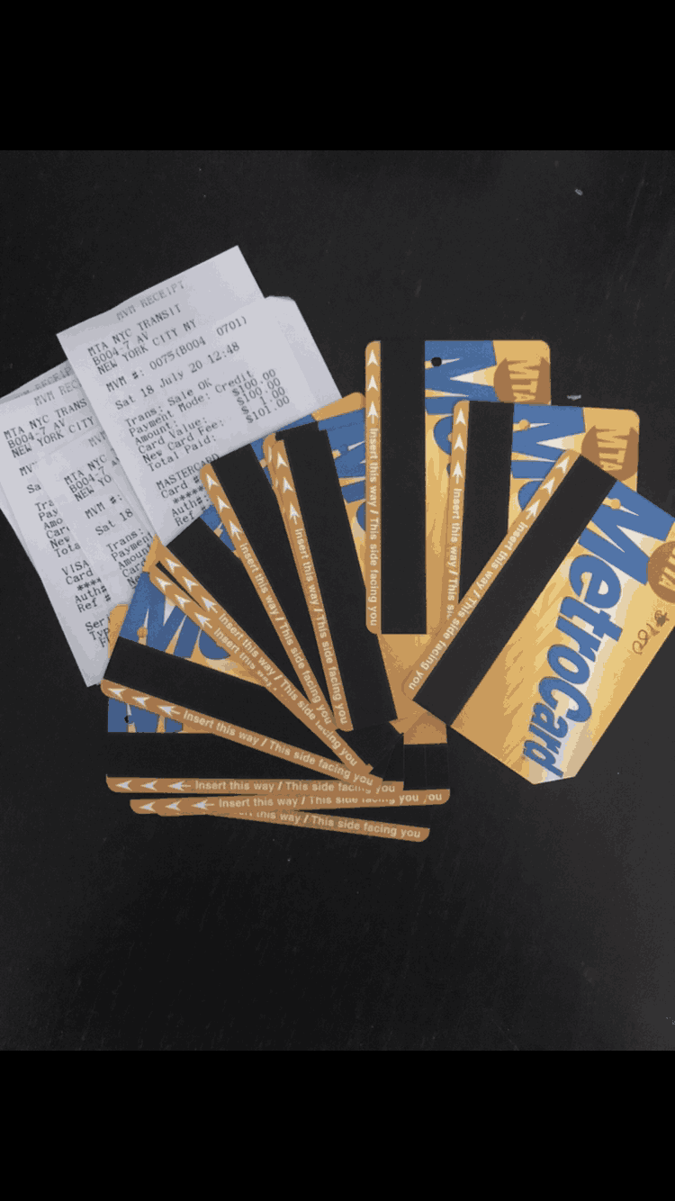 Pile of donated MetroCards with MTA receipts